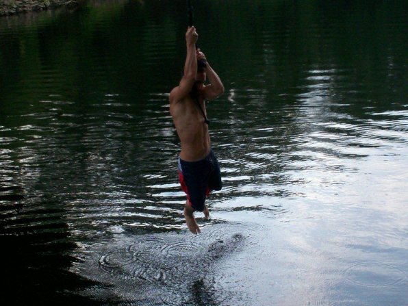 Paul Jacobs, 19, of Northfield jumps the legal way: using the rope swing die-hards hung for everyone to use at the Boscawen-Canterbury trestle on the Merrimack River.