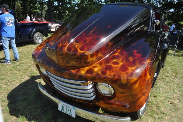 The fiery hood of a 1948 Ford F-1 pickup.