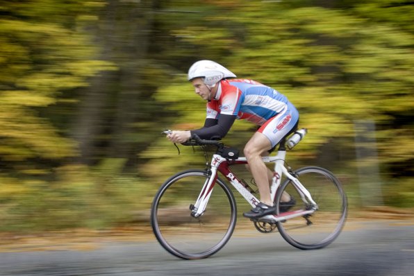 Jeremy Woodward may appear to be cruising along here, but it took him 15 grueling hours to complete his first Ironman triathlon in Lake Placid. Sweet aerodynamic helmet, though.