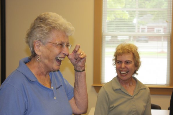 Caryl Lajoie of Concord and Carol Goward of Bow yuk it up.