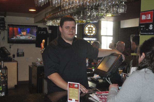 Bill Dunn mans the bar at Tandy’s Top Shelf.