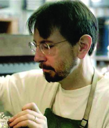 John Lunn crafts ornate flutes in his Newport studio.