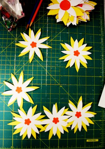 Handmade paper flowers from a previous craft session.