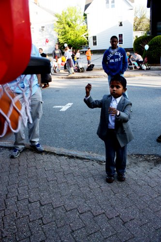 Philip Kami, 6, uses some body language to guide his shot through the hoop.