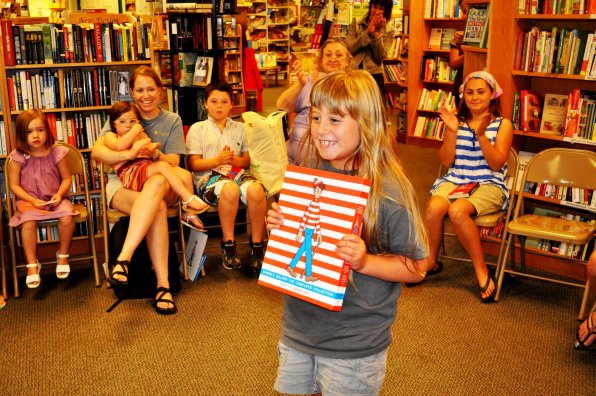 Lucie Speidel, 8, proudly displays the grand prize, a boxed set of Where’s Waldo books.