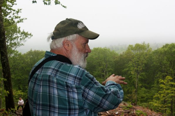 Ron Klemarczyk surveys a new vista on the Marjory Swope trail. On a clear day, you can see Mt. Monadnock!