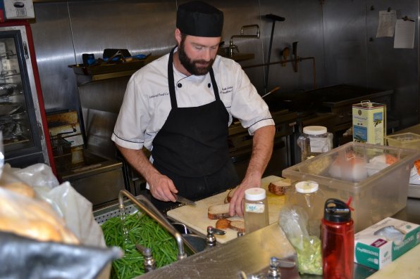 Co-op chef Scott Jones slaves away in the kitchen.