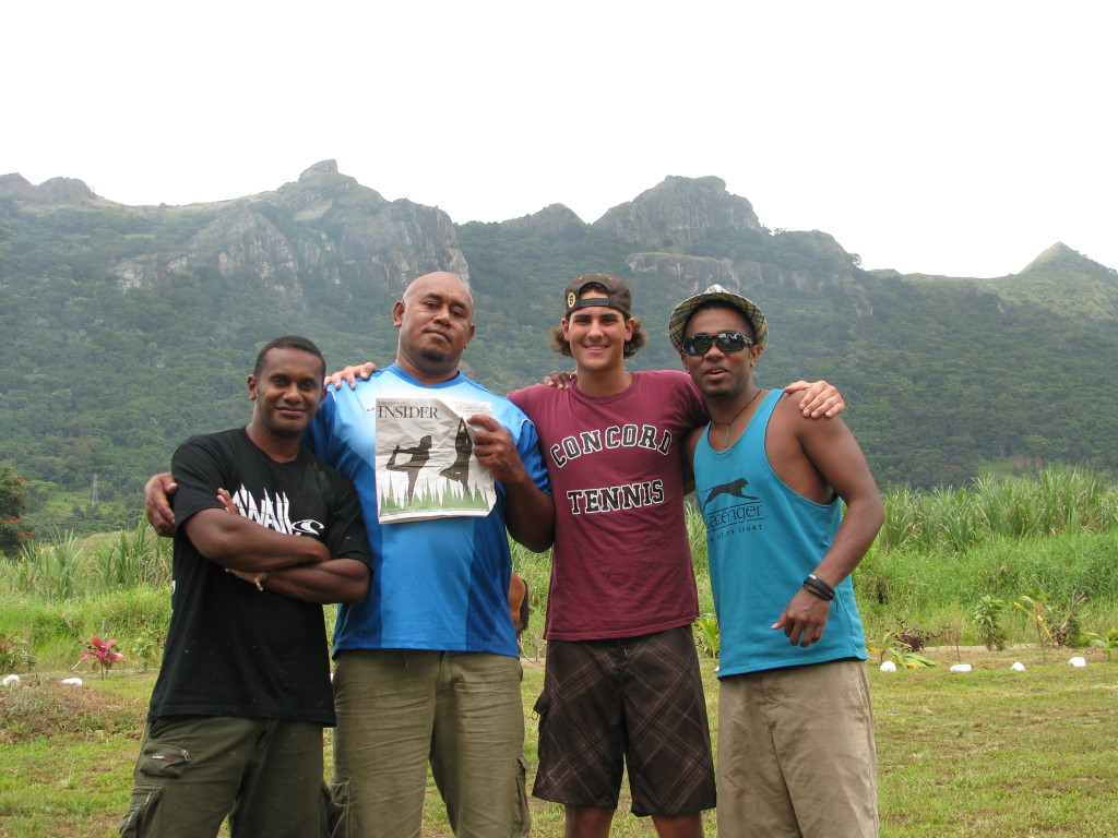 Jeff Reagan of Concord, New Hampshire, while studying abroad in Australia, took a trip down to Fiji. Here he is sharing his Insider copy with some local Fijians in the middle of Viti Levu, Fiji's largets island.