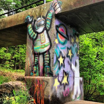 Some crazy graffiti along the Contoocook River.