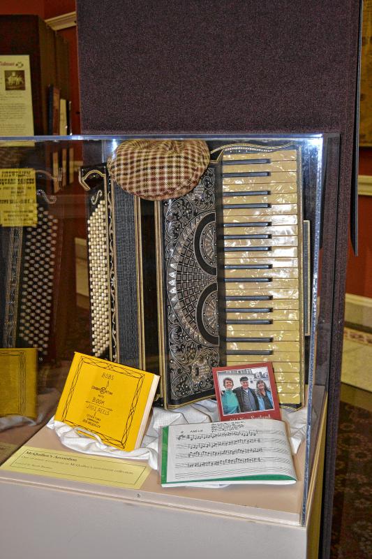 Bob McQuillen’s accordion, hat and other mementos. (TIM GOODWIN / Insider staff) - 
