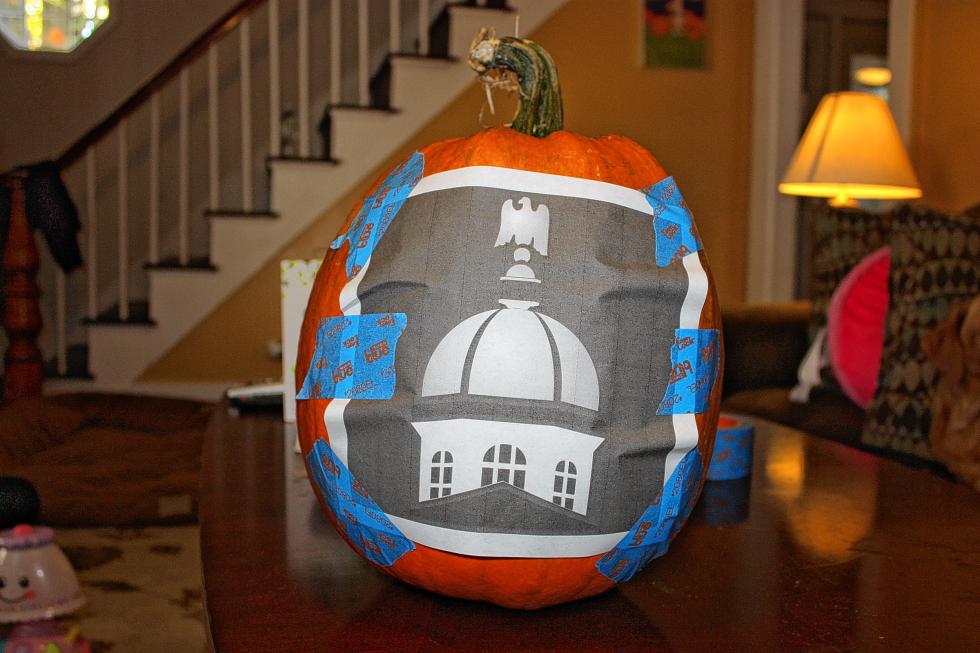 Painter's tape works well in this application. Sometimes regular Scotch tape won't stick to the pumpkin. Duct tape can leave a sticky residue. (JON BODELL / Insider staff) - 

