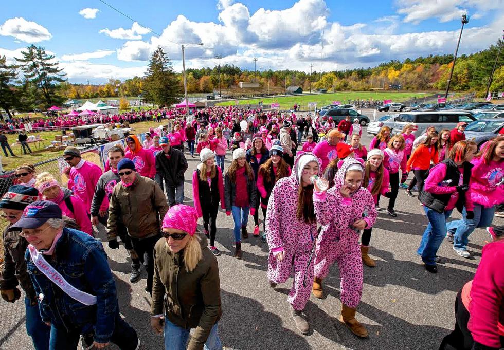 Sunday’s 22nd annual Making Strides in Concord saw nearly 5,000 people take part and brought in $466,871 in the fight against breast cancer. Since the first walk, more than $7 million has been raised during the yearly Concord event. (GEOFF FORESTER / Monitor staff) - 
