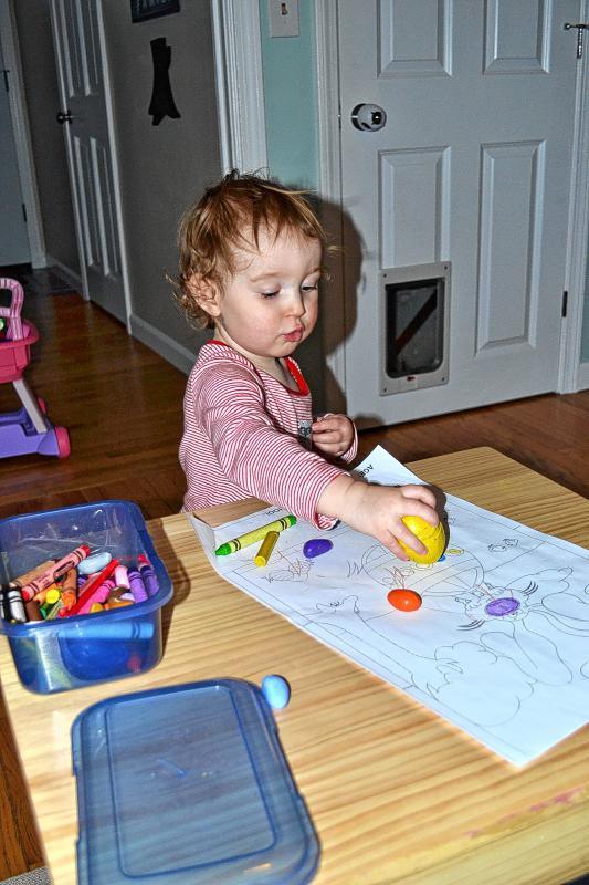 Tim’s daughter, Sophie, uses her Easter egg crayons on her submission for the coloring contest. Looks like you’ve got some competition. (TIM GOODWIN/ Insider staff) -