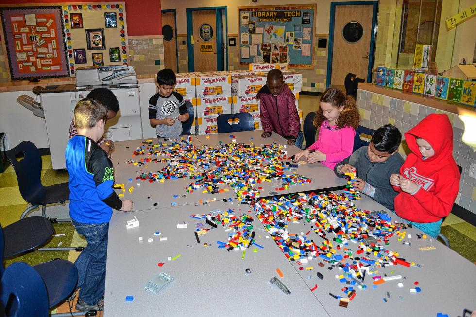 That sure is a lot of Legos. No wonder these Mill Brook students have so much fun building whatever it is they’re asked to build during Lego City that day. (TIM GOODWIN / Insider staff) -