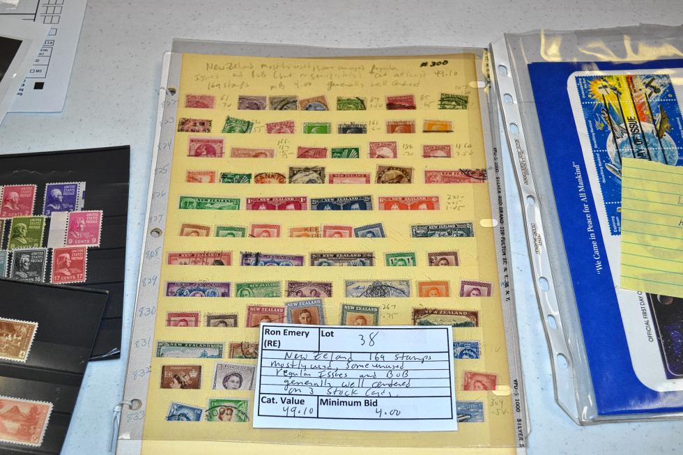 Now those look like some old stamps. You never know what you’re going to find when the stamp collectors get together for their bimonthly auctions. (TIM GOODWIN / Insider staff) -
