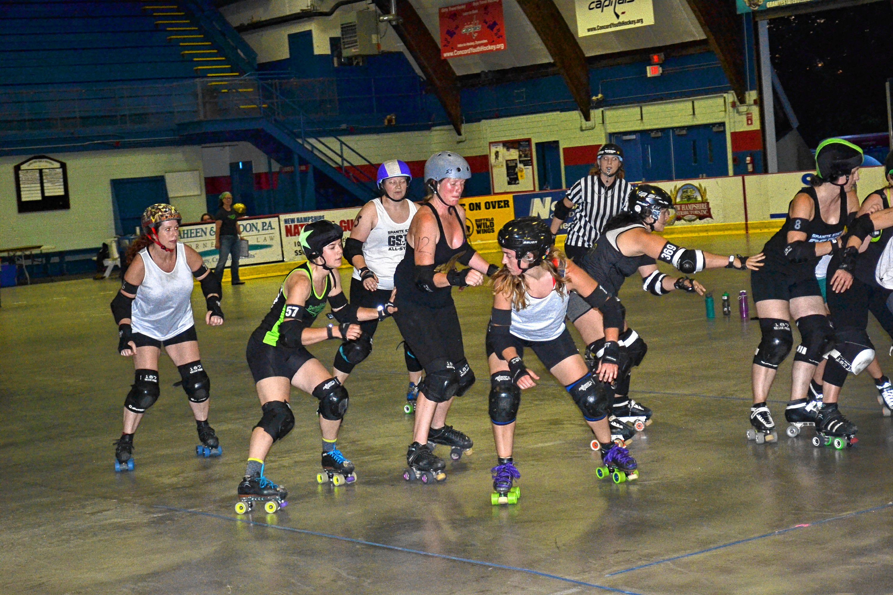 Tim Goodwin / Insider staffLeft: Missy Riot, aka Kim Blank, just gets by the last defender to score an extra point during a scrimmage last week at Everett Arena. Right: Even though the Demolition Dames and Fighting Finches were mixed up at practice last week, there was plenty of intensity to go around.