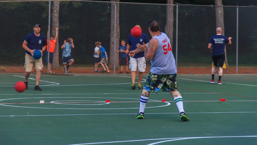 Lucky's Barber Shop faces off against the Concord Police Department in a dodge ball tournament during National Night Out. August 2, 2016 (JENNIFER MELI / Monitor Staff)