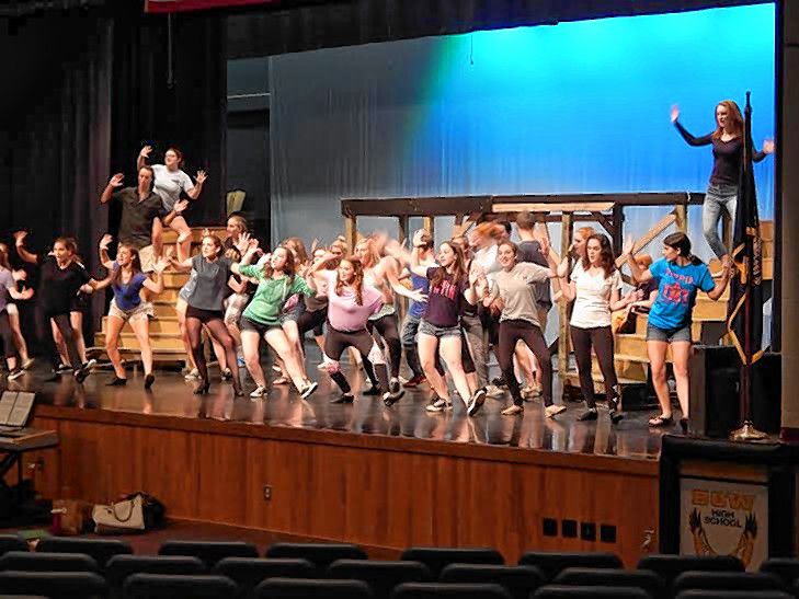 Megan Marshall / Insider internCast members for “Pippin,” being put on by Bow Performing Arts, work a full cast scene last week during a rehearsal. The show will run Thursday through Sunday at Bow High School.
