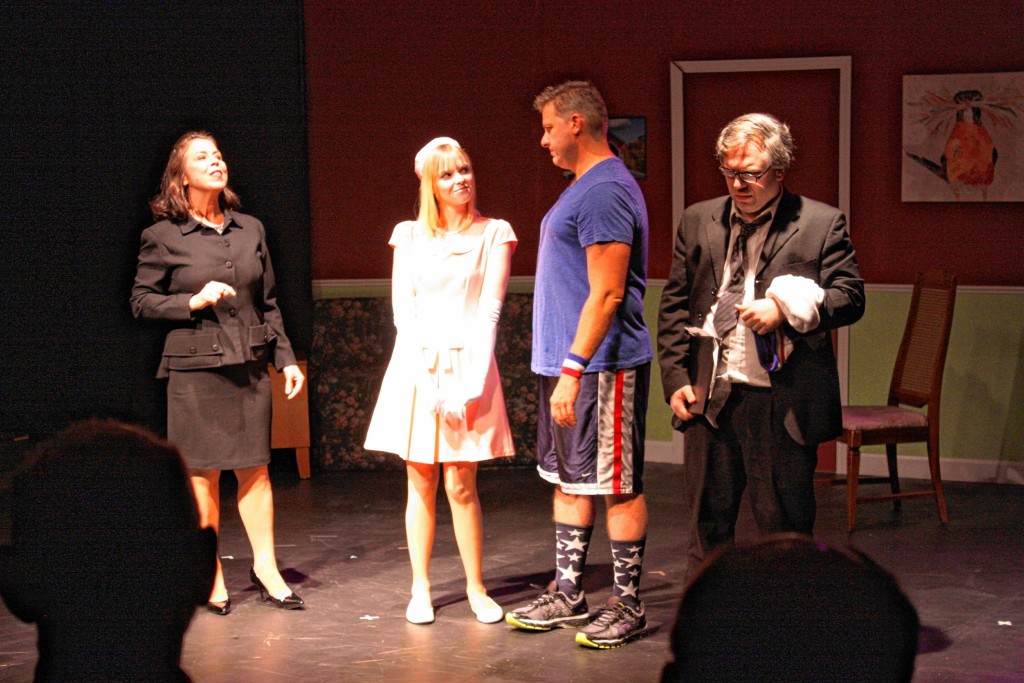 JON BODELL / Insider staff From left: Actors Deirdre Hickock Bridge, Jackie Coffin, David Afflick and Kelly Litt perform a scene from “Candid Candidate” at Hatbox Theatre last week.
