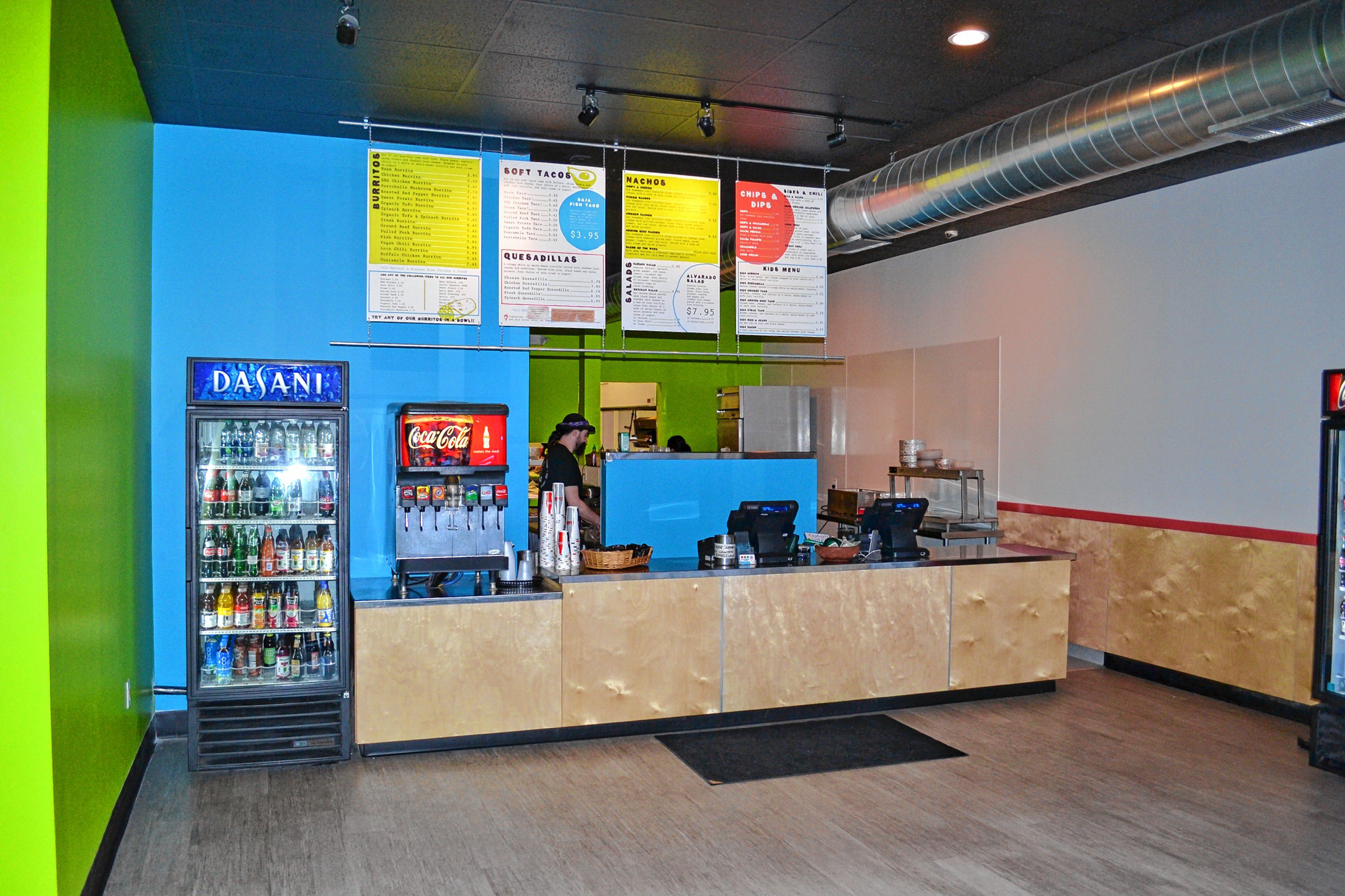 Top left: Check out the new burrito table. Above: Dos Amigos is back open for business after an extensive renovation, and just look at this new and improved space to order your meal. Bottom left: Those burritos sure make us want to go out for lunch today.