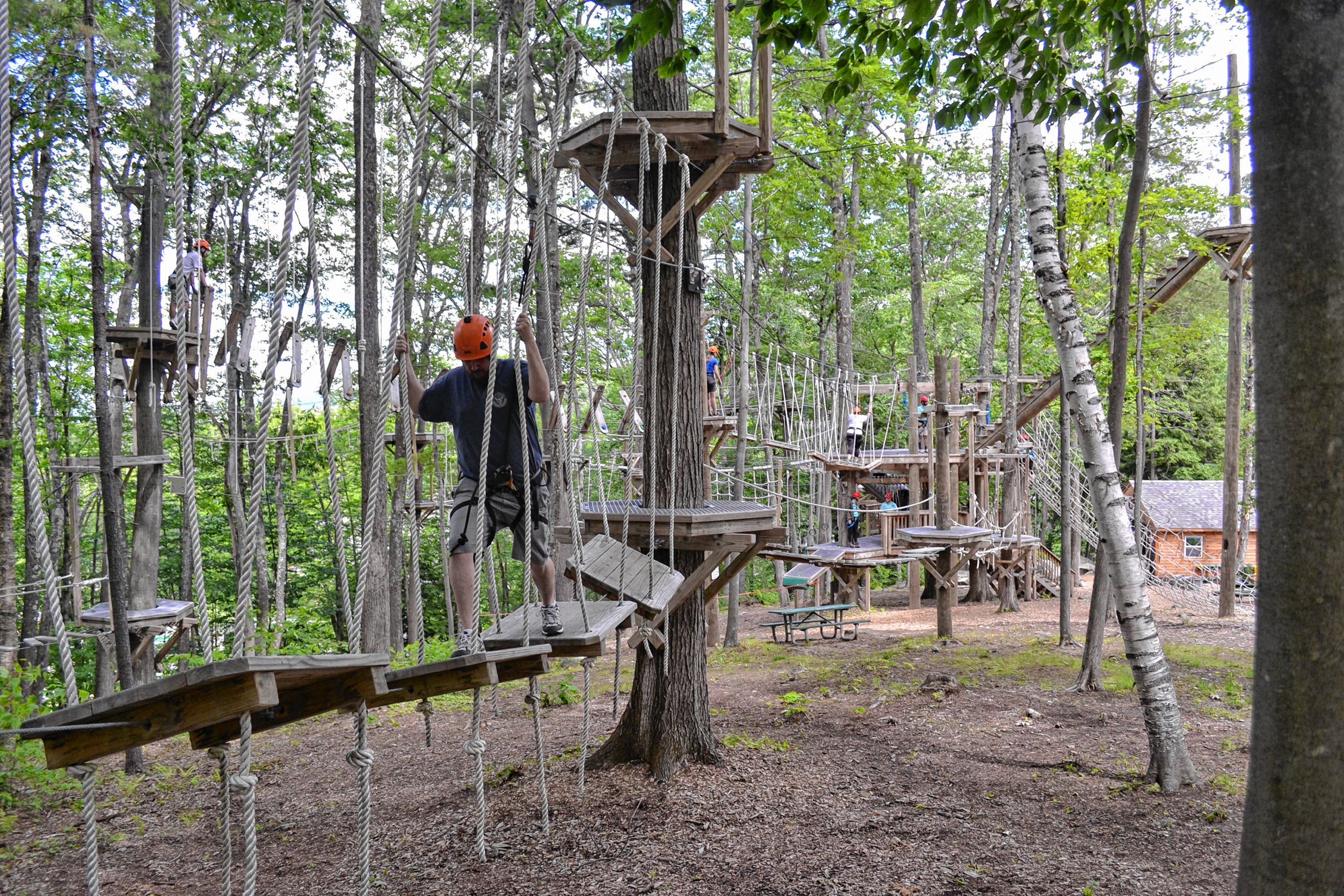 Tim took a spin around the aerial challenge course at Mount Sunapee's adventure park. MEGAN BURCH / For the Insider