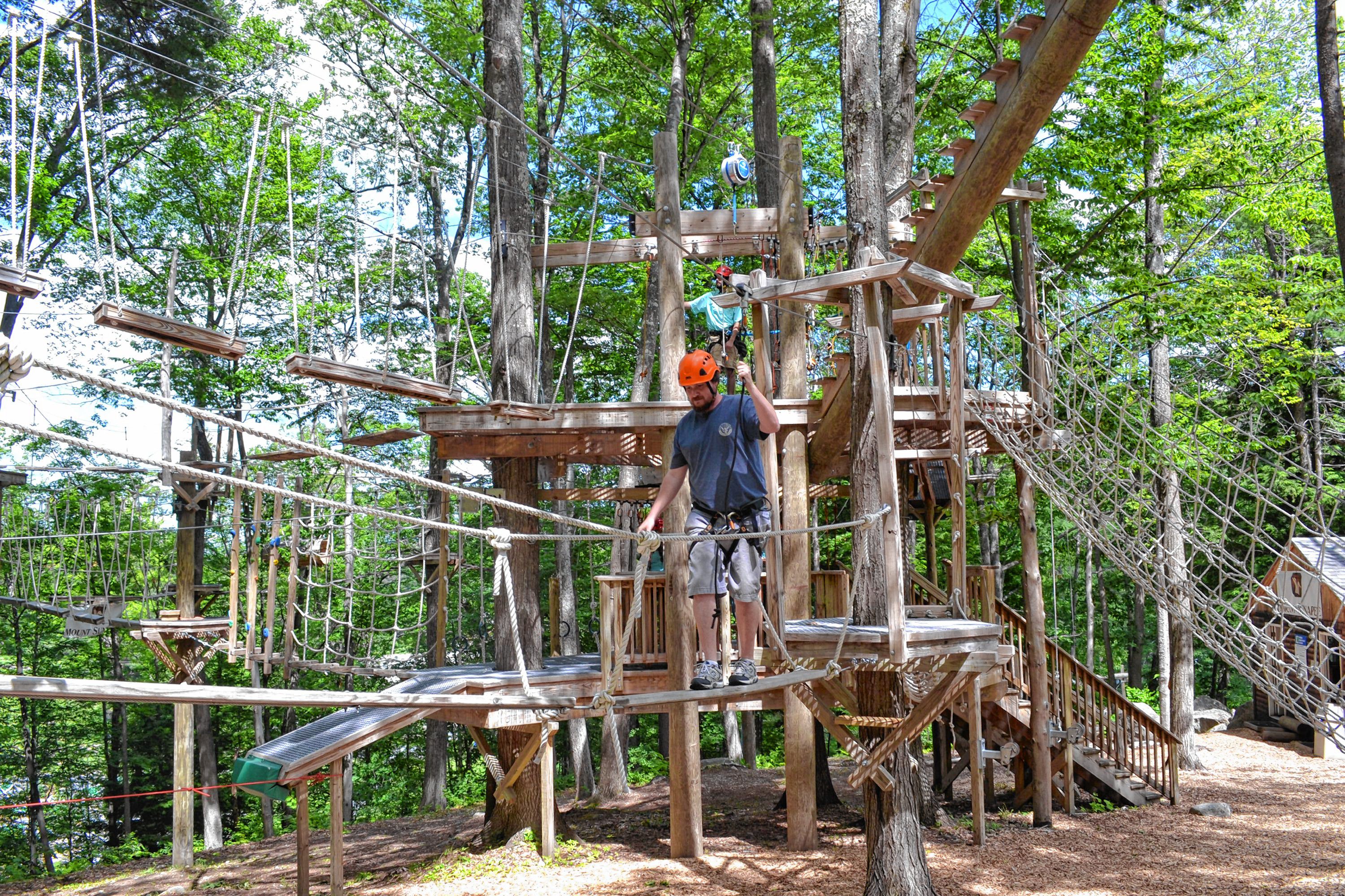 Tim took a spin around the aerial challenge course at Mount Sunapee's adventure park. MEGAN BURCH / For the Insider