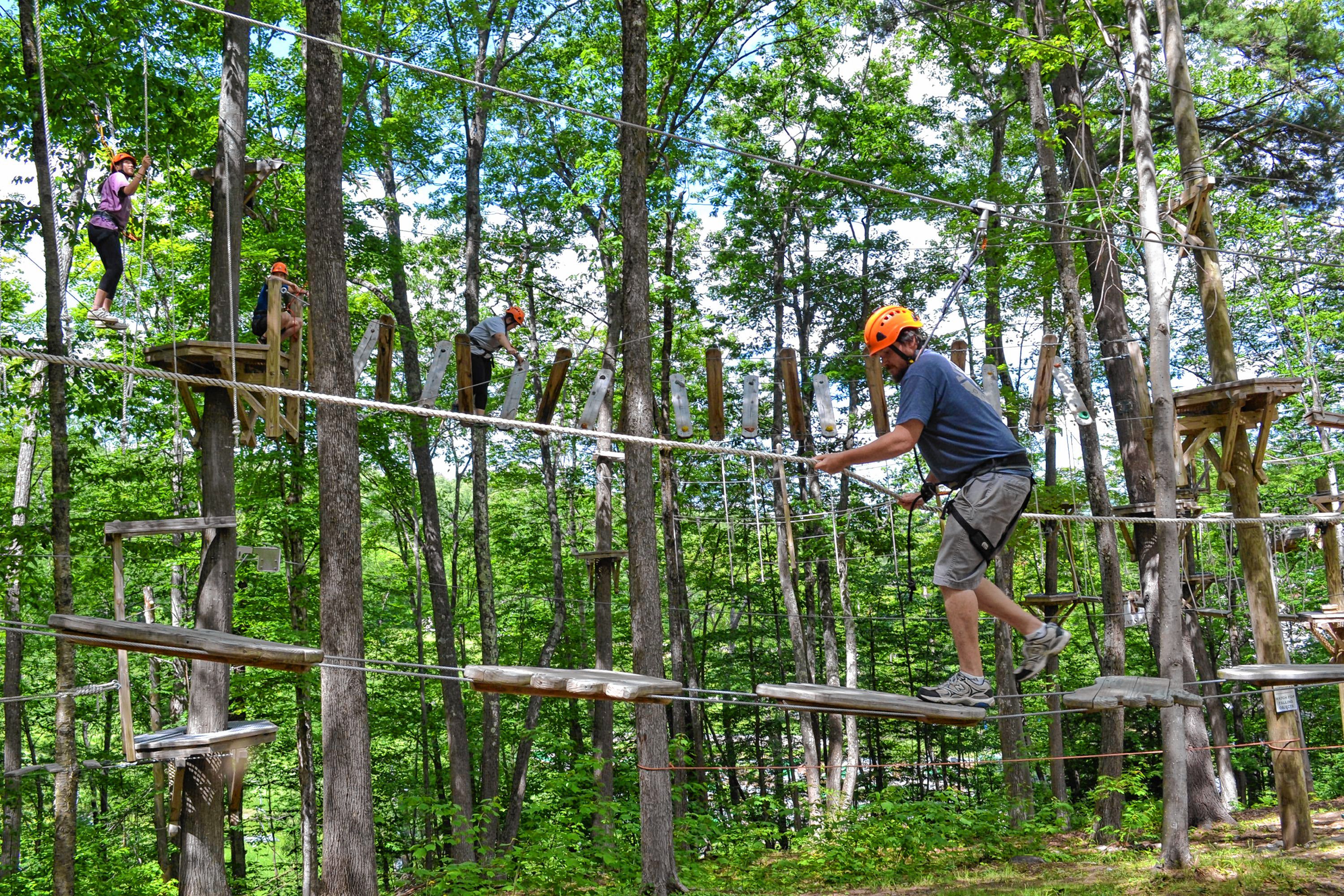 Tim took a spin around the aerial challenge course at Mount Sunapee's adventure park. MEGAN BURCH / For the Insider