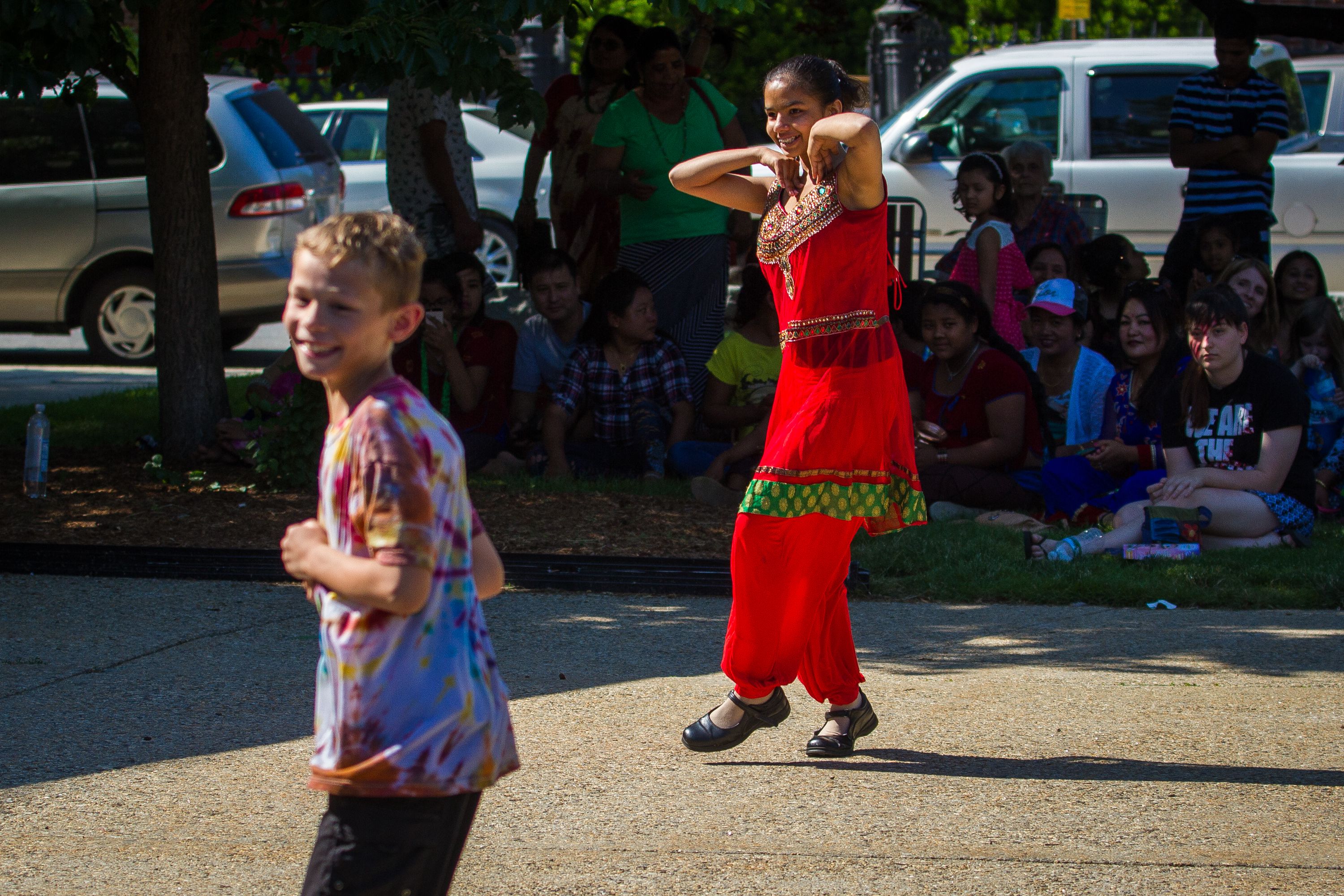 Lochana Sharma (right), 14, and 9-year-old Logan Miller dance to the music during the Concord Multicultural Festival downtown on Saturday, June 25, 2016. (ELIZABETH FRANTZ / Monitor staff) Elizabeth Frantz