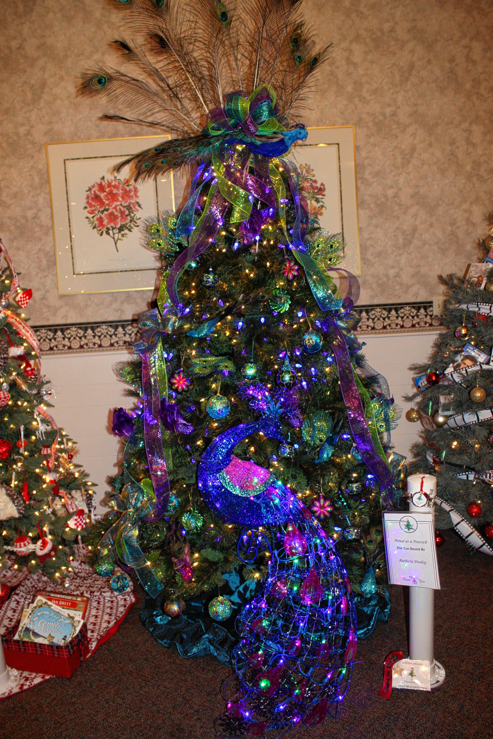 Try to win one of more than 100 fake trees at the Feztival of Trees