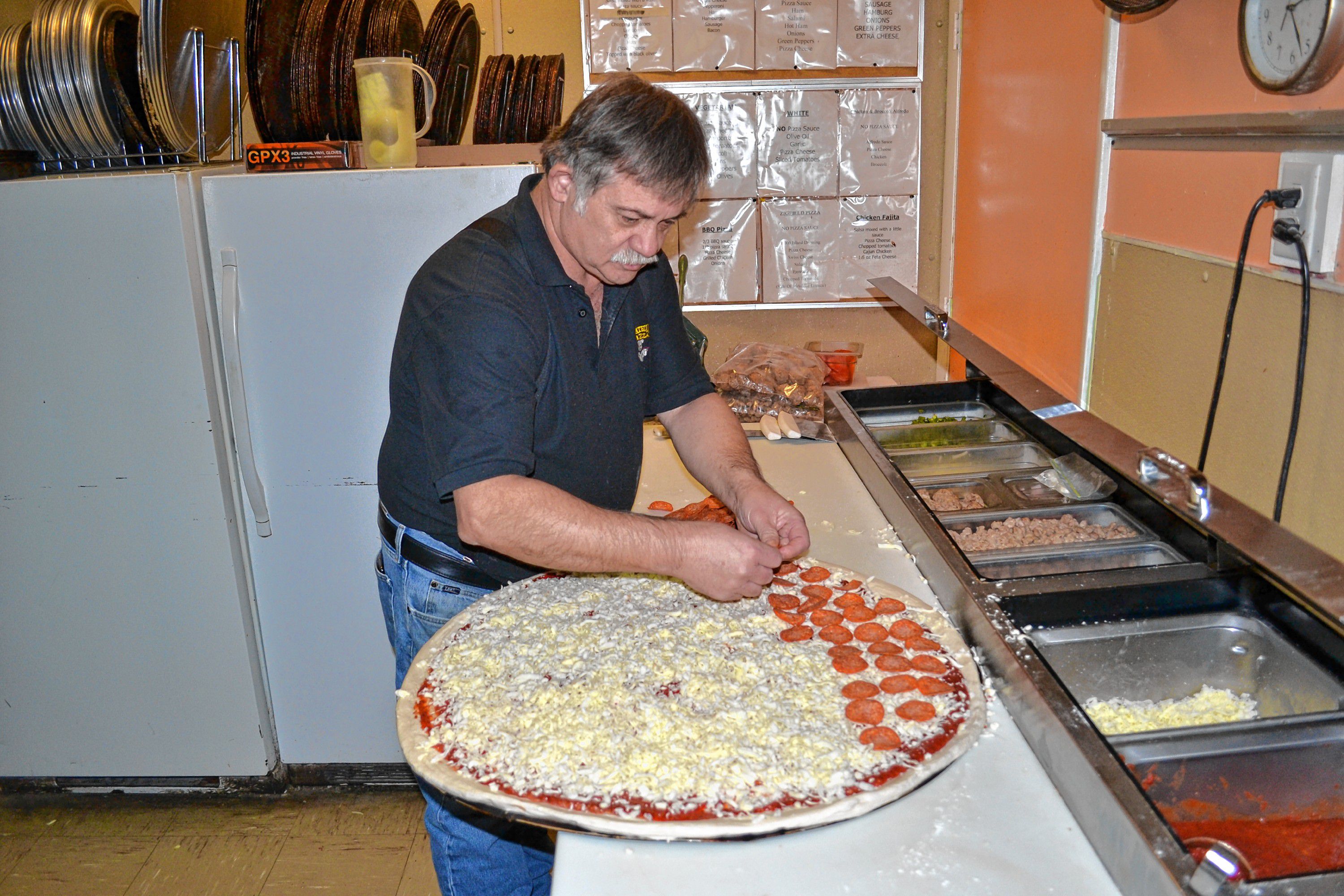 If you get pepperoni on your super dominator from Donatello's, expect to see anywhere from 92 to 120 of the popular topping. This one got 112 pepperonis. TIM GOODWIN / Insider staff