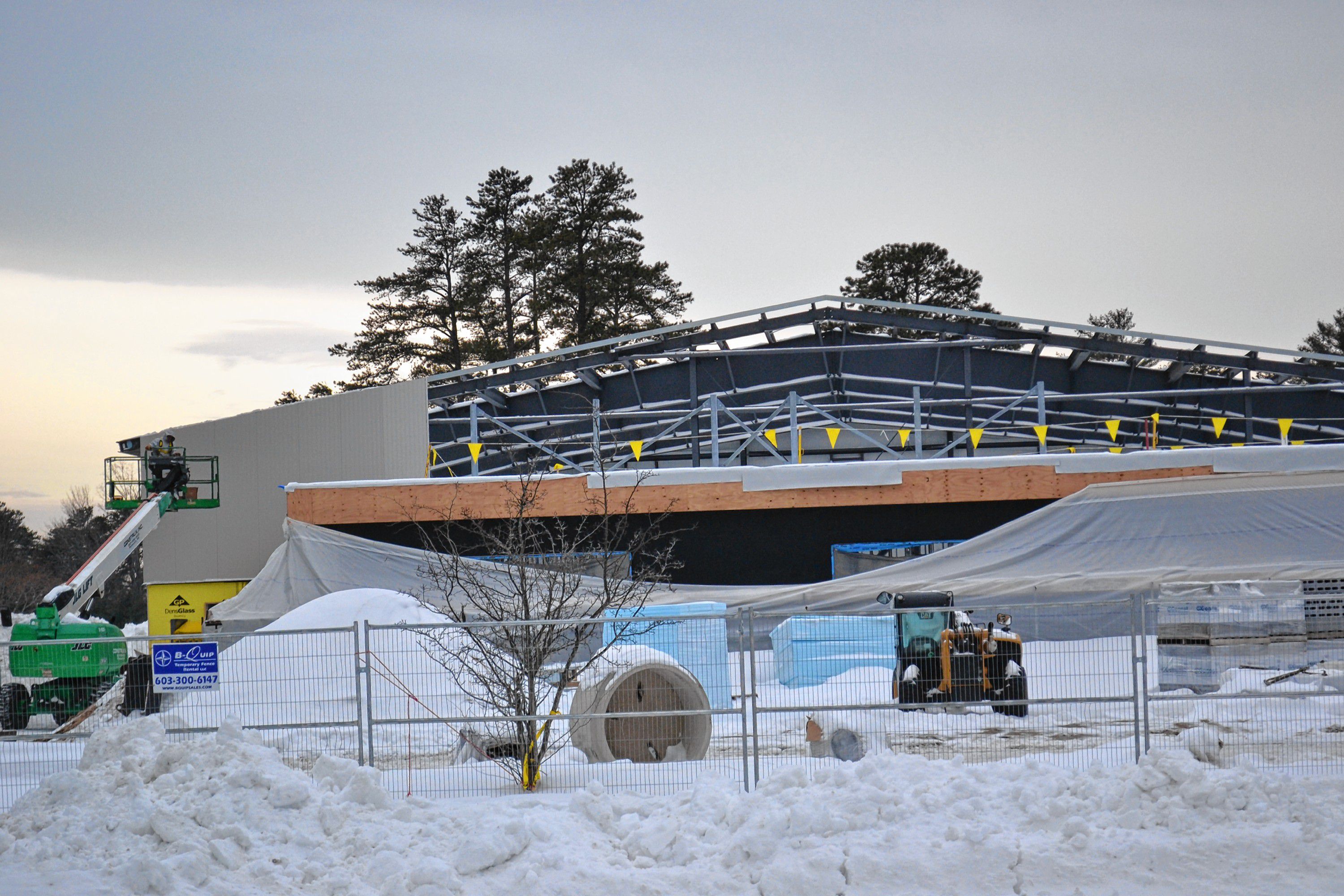 Despite a little cold weather work continues on the new city community center on the Heights, which is scheduled to open in June, just in time for summer. TIM GOODWIN / Insider staff