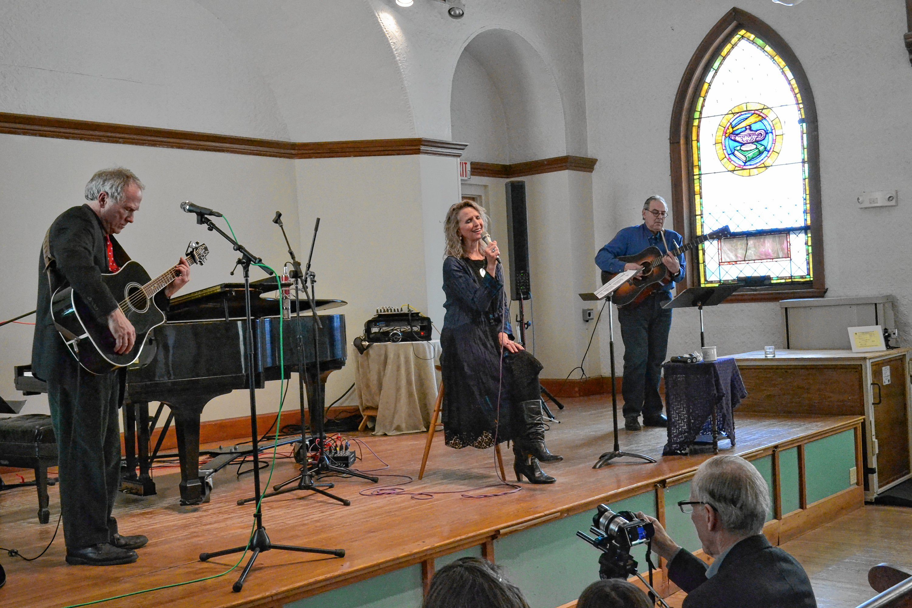 Peggo Horstmann Hodes and Kent Allyn (left) are joined by special guest Paul Hodes for a few songs during the Bach's Lunch concert. TIM GOODWIN / Insider staff