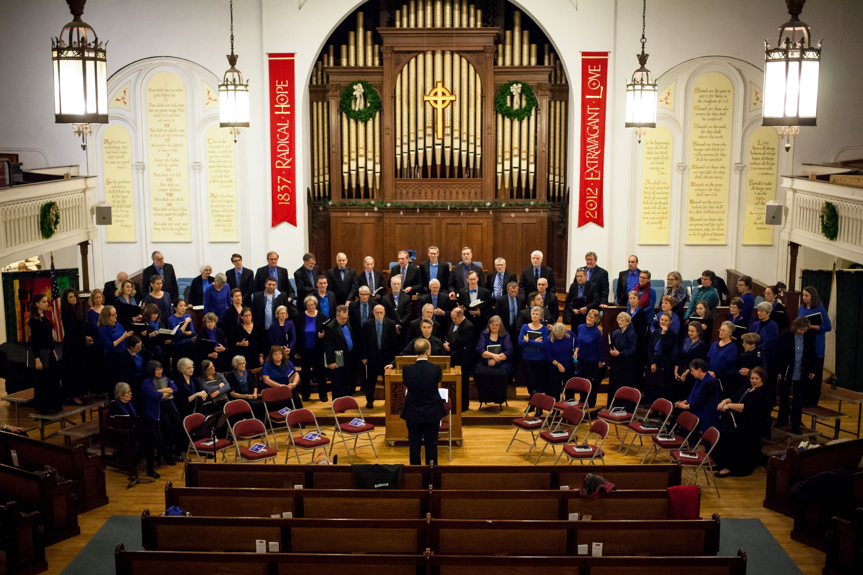 The Concord Chorale vocal ensemble warms up for a performance titled "Behold, I Bring you Glad Tidings" at South Congregational Church in Concord on Friday, Dec. 8, 2017. (ELIZABETH FRANTZ / Monitor staff) Elizabeth Frantz