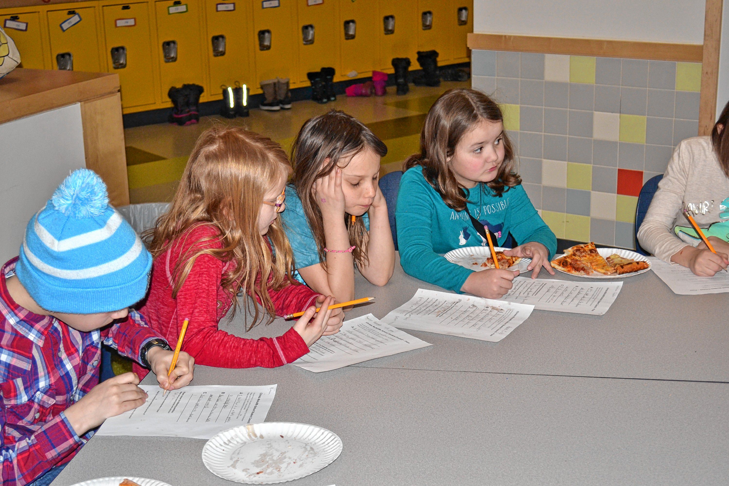 Rowan Arndt, Laylen Schmidt, Annie Culp and Veronica Galdieri work through their decisions as to which place has the best pizza. TIM GOODWIN / Insider staff