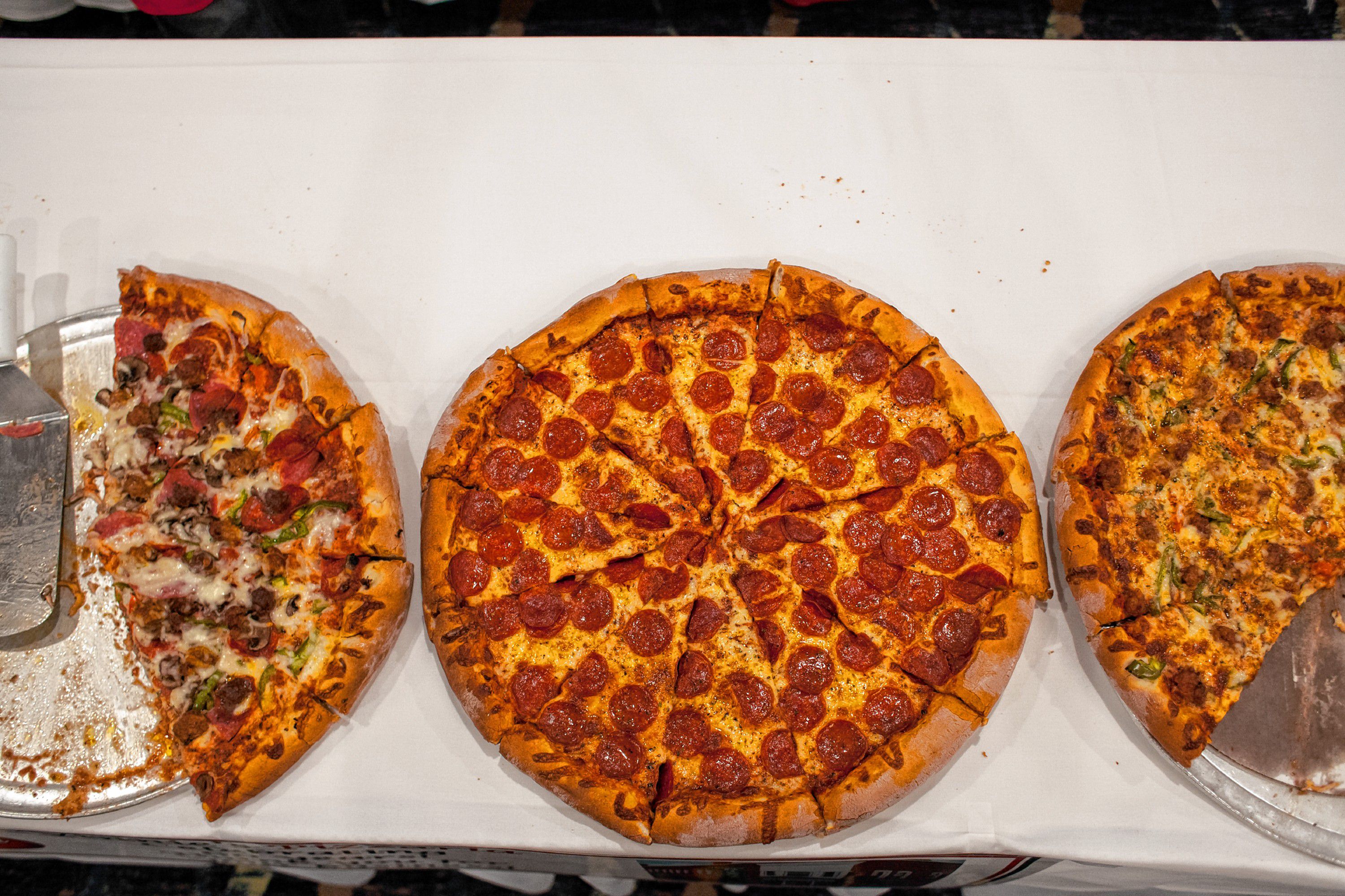 A Vinnie' s Pizzaria pepperoni pie is seen during the Pizza Pie Showdown at the Holiday Inn in downtown Concord on Pi Day, Mar. 14, 2018. Proceeds from the event, hosted by the Concord Monitor and Insider, went to support the Friendly Kitchen. (ELIZABETH FRANTZ / Monitor staff) Elizabeth Frantz