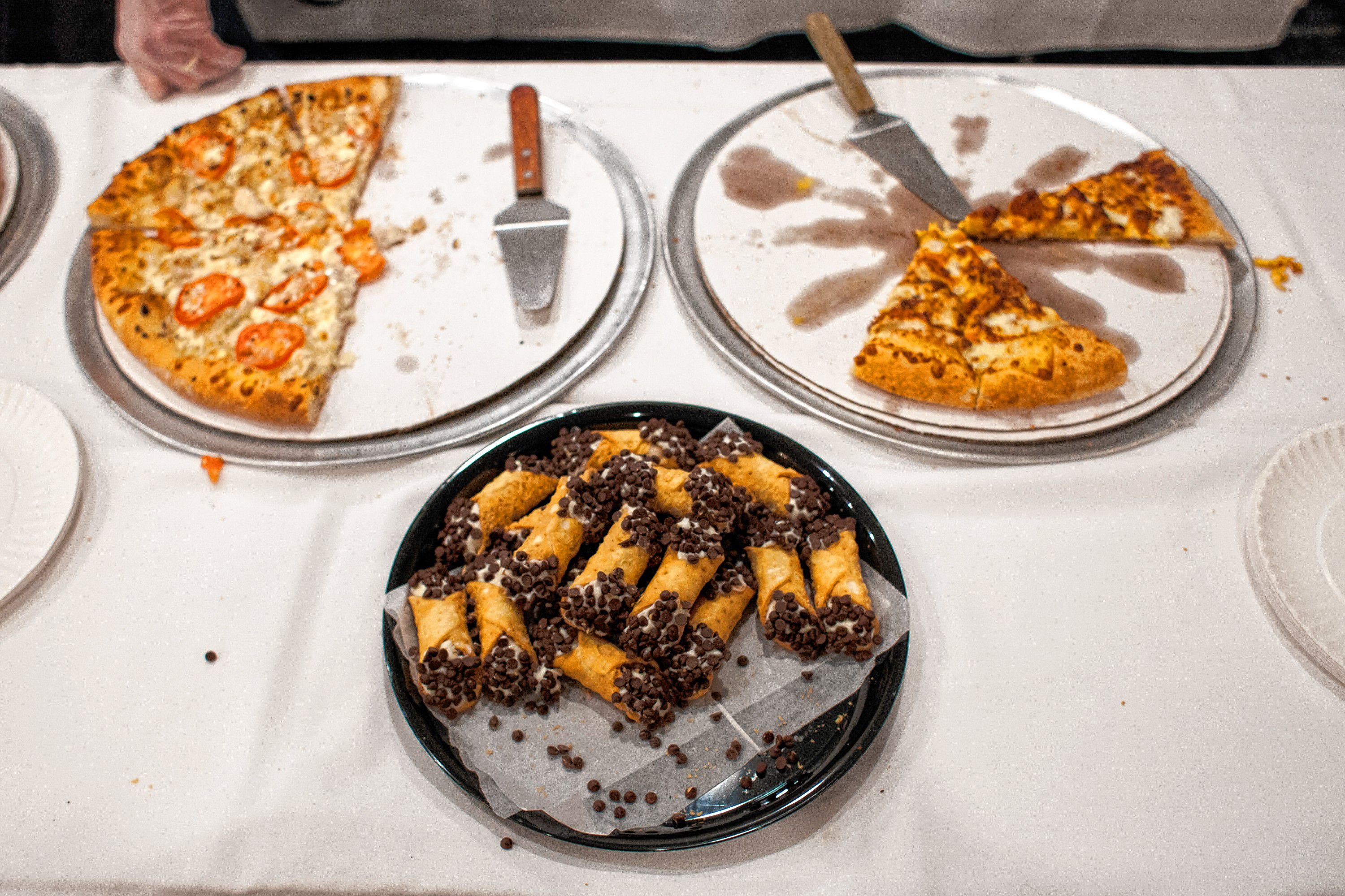 Constantly Pizza serves slices during the Pizza Pie Showdown at the Holiday Inn in downtown Concord on Pi Day, Mar. 14, 2018. Proceeds from the event, hosted by the Concord Monitor and Insider, went to support the Friendly Kitchen. (ELIZABETH FRANTZ / Monitor staff) Elizabeth Frantz