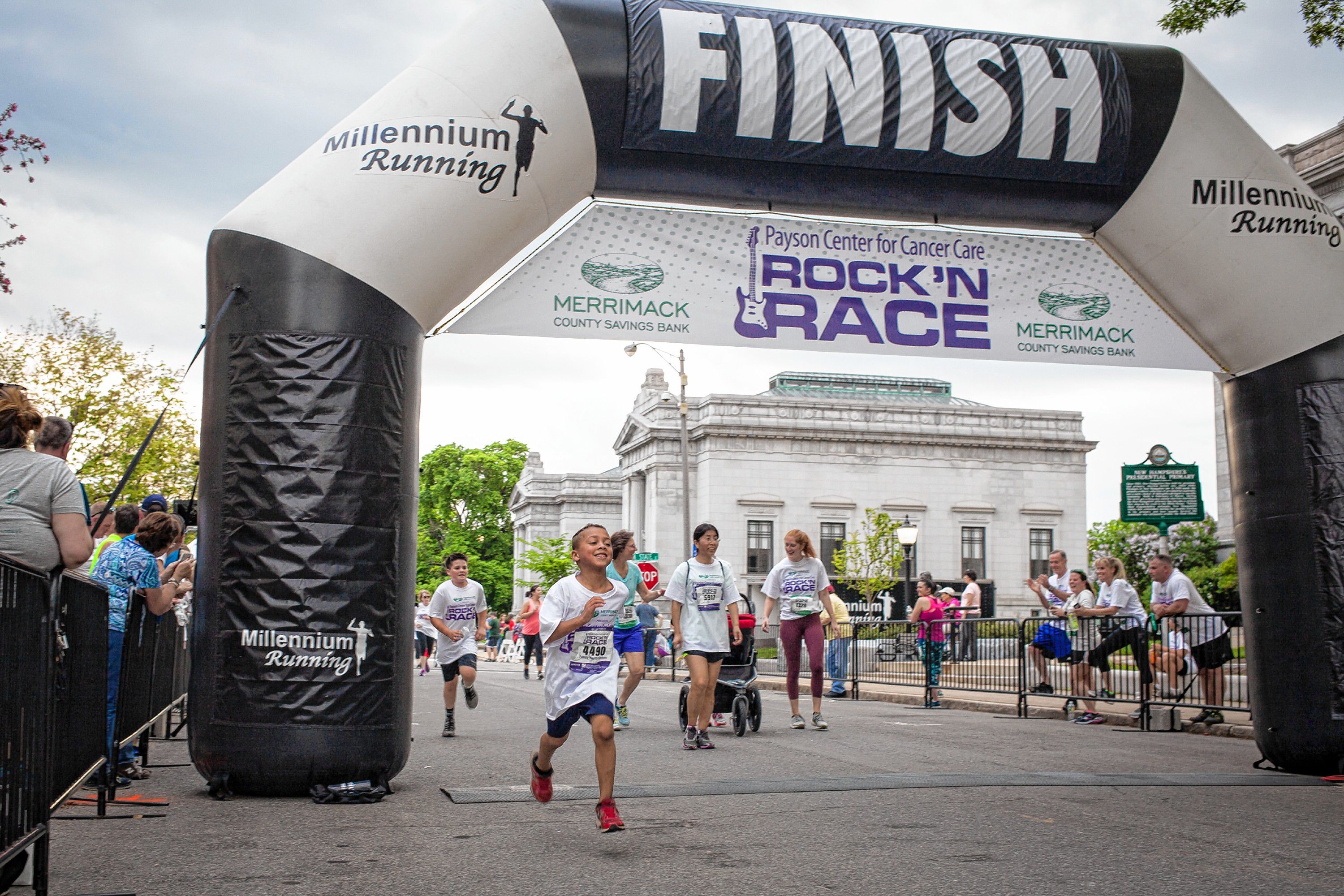 Participants cross the finish line of the annual Rock 'N Race 5K in downtown Concord on Thursday, May 17, 2018. (ELIZABETH FRANTZ / Monitor staff) Elizabeth Frantz