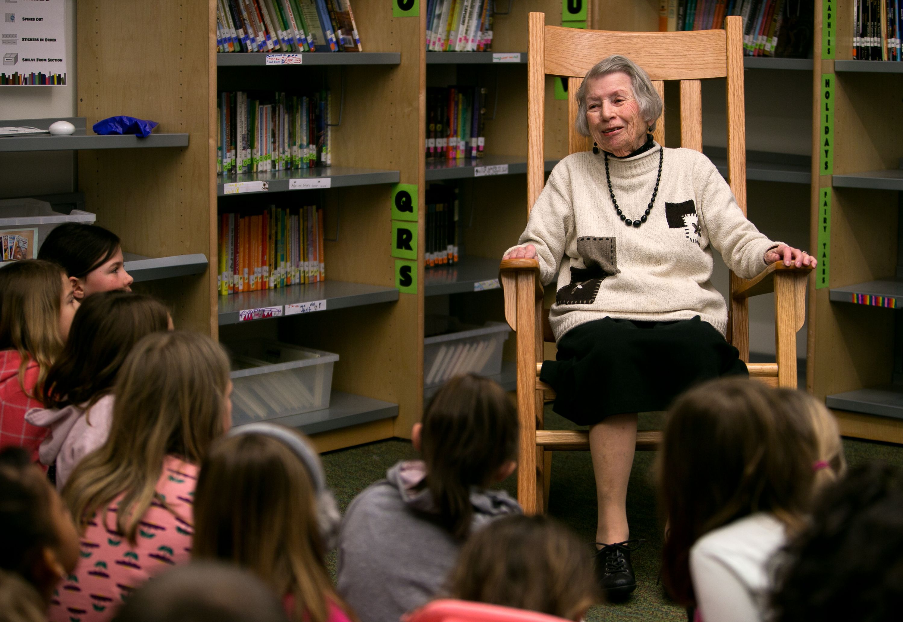 Clara Brogan, 92, spins a story to the second graders at Christa McAullife School in Concord Wednesday. Brogan comes in every other Thursday to do her storytelling at the school.  (GEOFF FORESTER / Monitor staff) GEOFF FORESTER