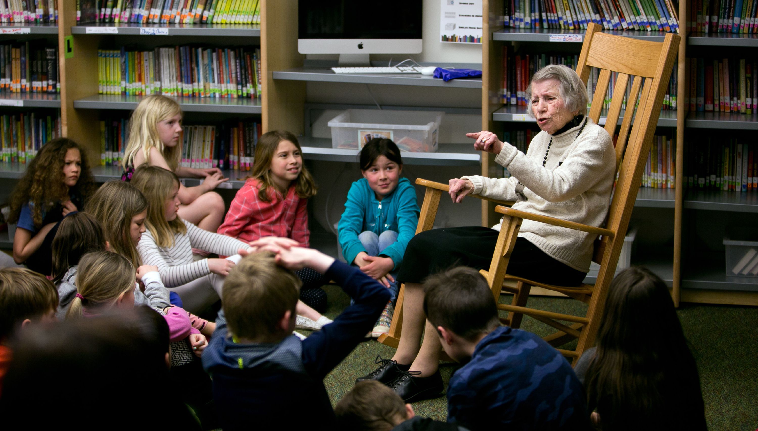 Clara Brogan, 92, spins a story to the second graders at Christa McAullife School in Concord Wednesday. Brogan comes in every other Thursday to do her storytelling at the school.  (GEOFF FORESTER / Monitor staff) GEOFF FORESTER