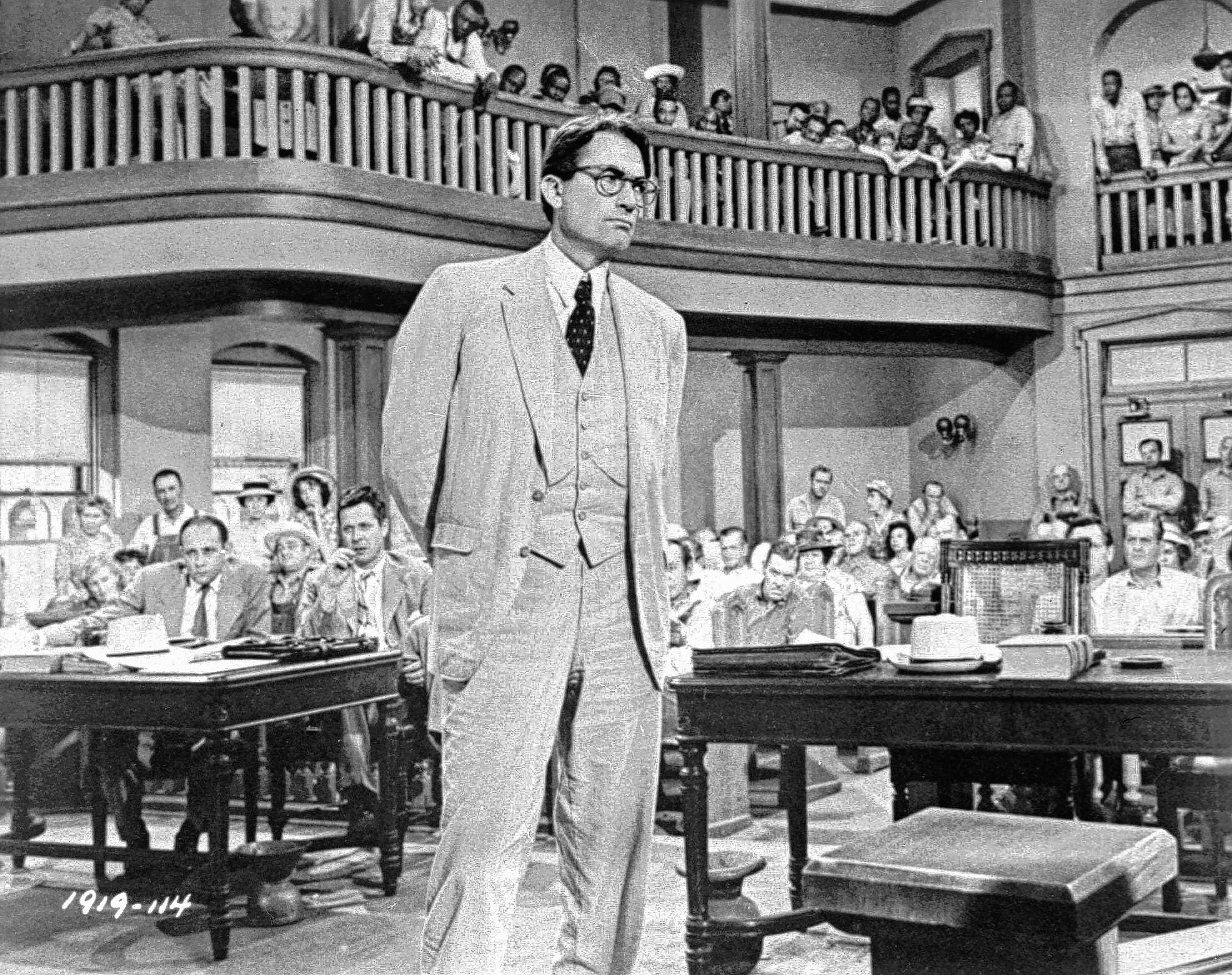 File ** In this file photo, Gregory Peck is shown as attorney Atticus  Finch, a small-town Southern lawyer who defends a black man accused of rape,  in a scene from the