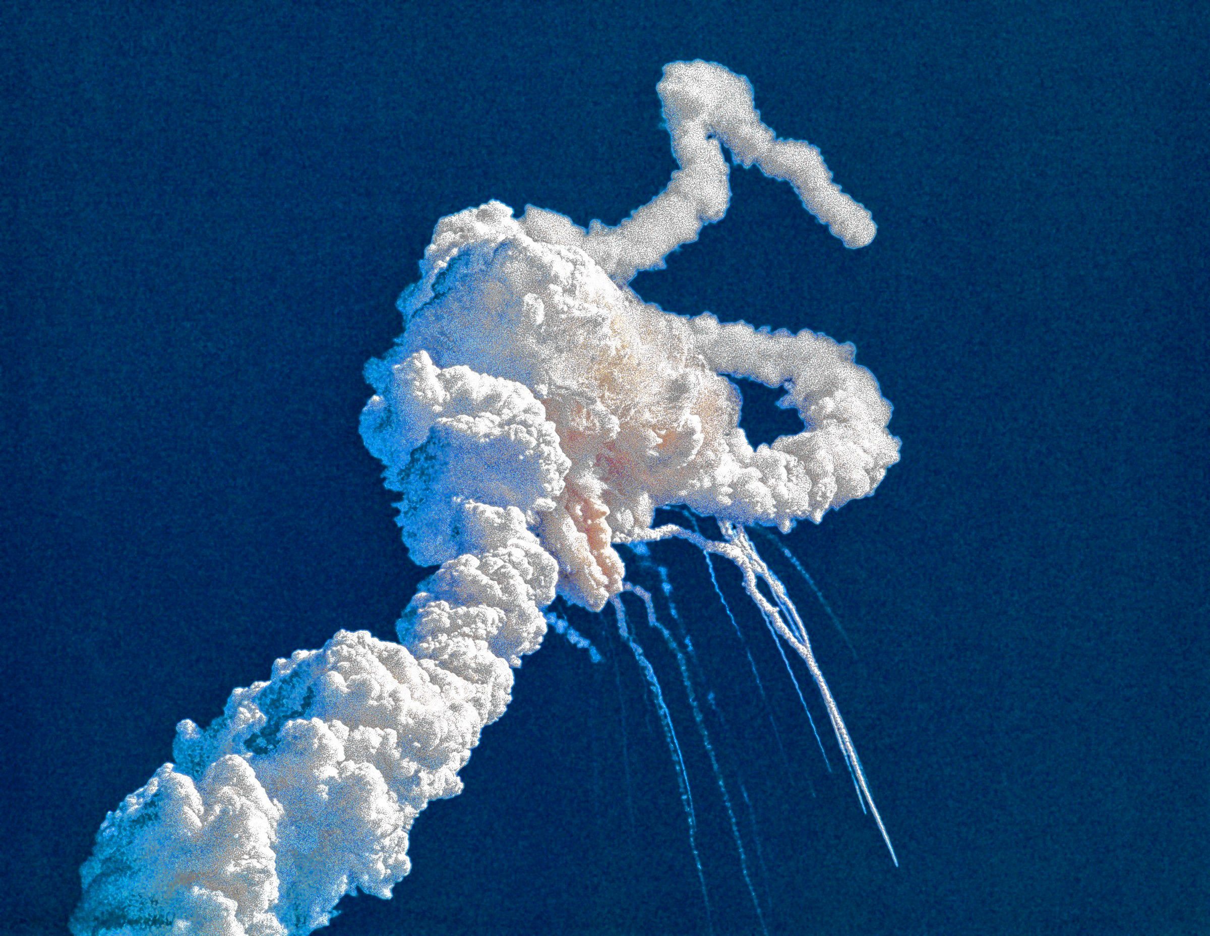 CAPE CANAVERAL, FLA. - Main engine exhaust, solid rocket booster plume and an expanding ball of gas from the external tank is visible seconds after the space shuttle Challenger accident on Jan. 28, 1986.   (photo credit: NASA) Courtesty