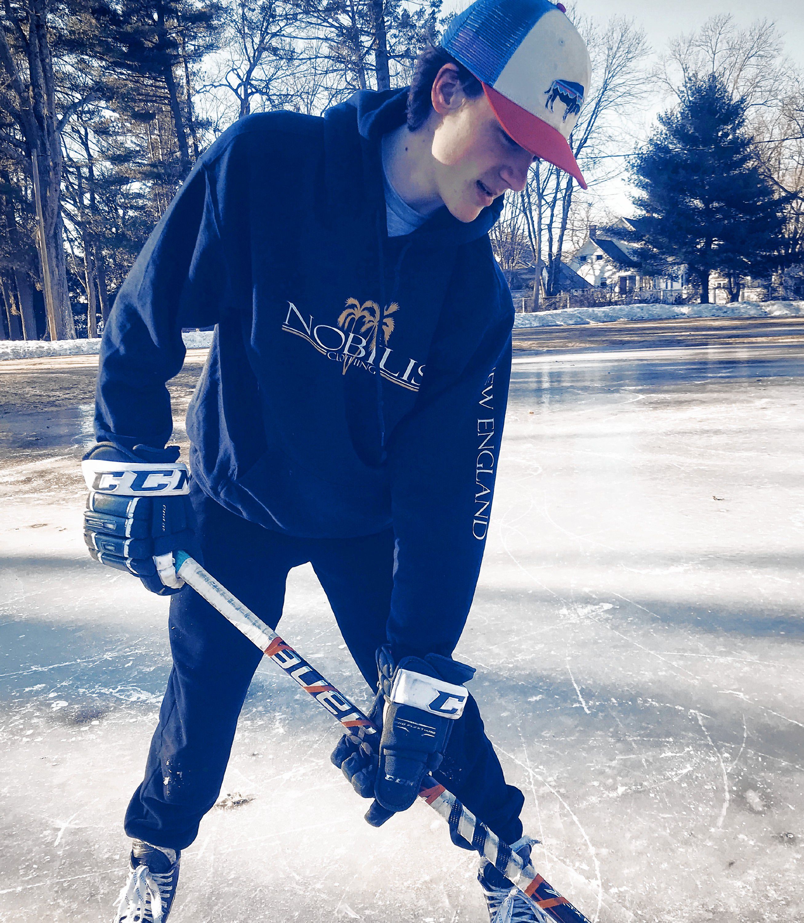 Scott Franklin's little brother, Michael, models a sweatshirt at Rollins Park in a promo shot for Franklin's clothing line Nobilis.  Scott Franklin