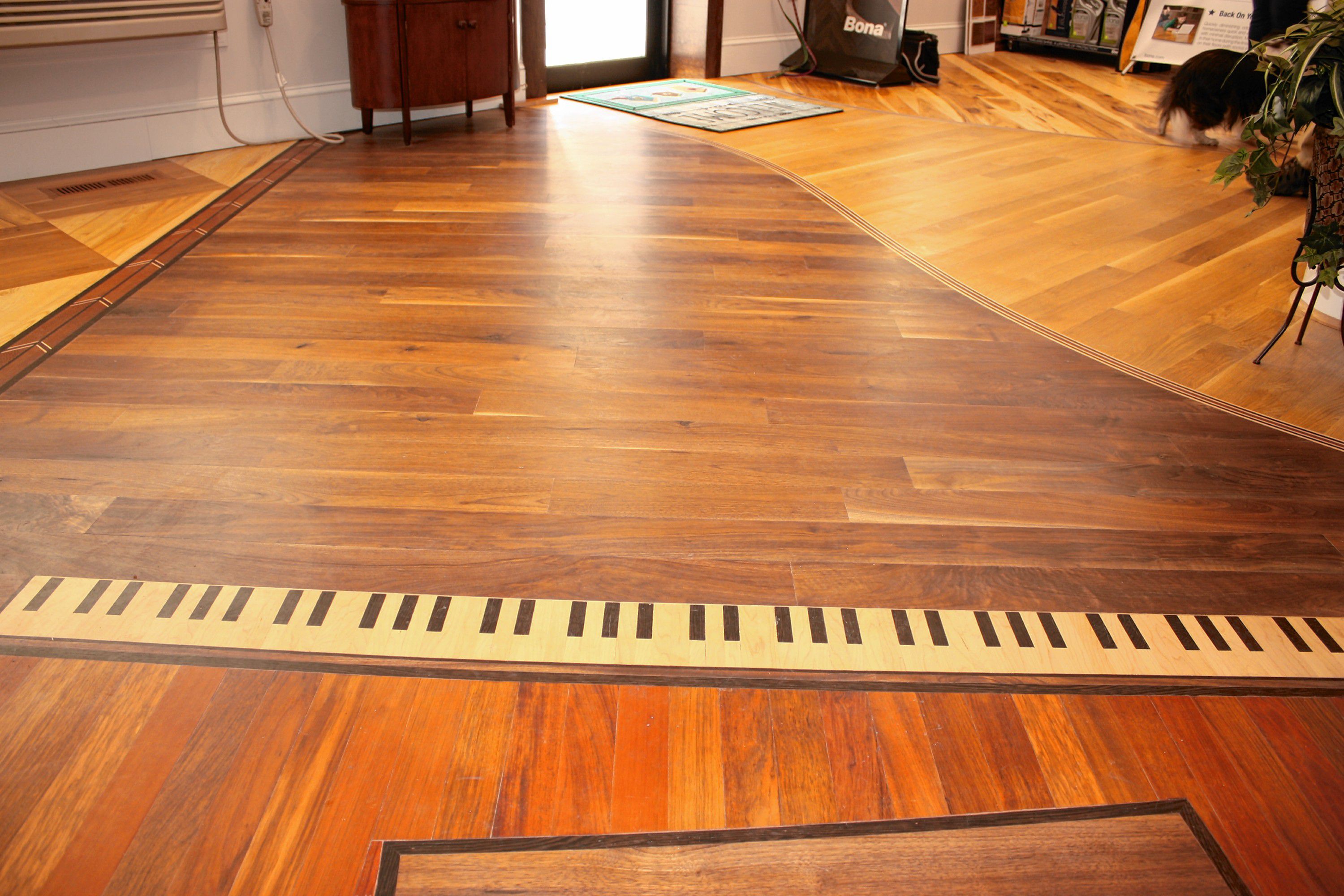 Olde Tyme Craftsmen sells and installs high-end wood floors, stairs and railings. From custom shapes cut into the floor using exotic woods to traditional prefinished hardwood, if you can walk on it, Olde Tyme Craftsmen  can make and install it. JON BODELL / Insider staff