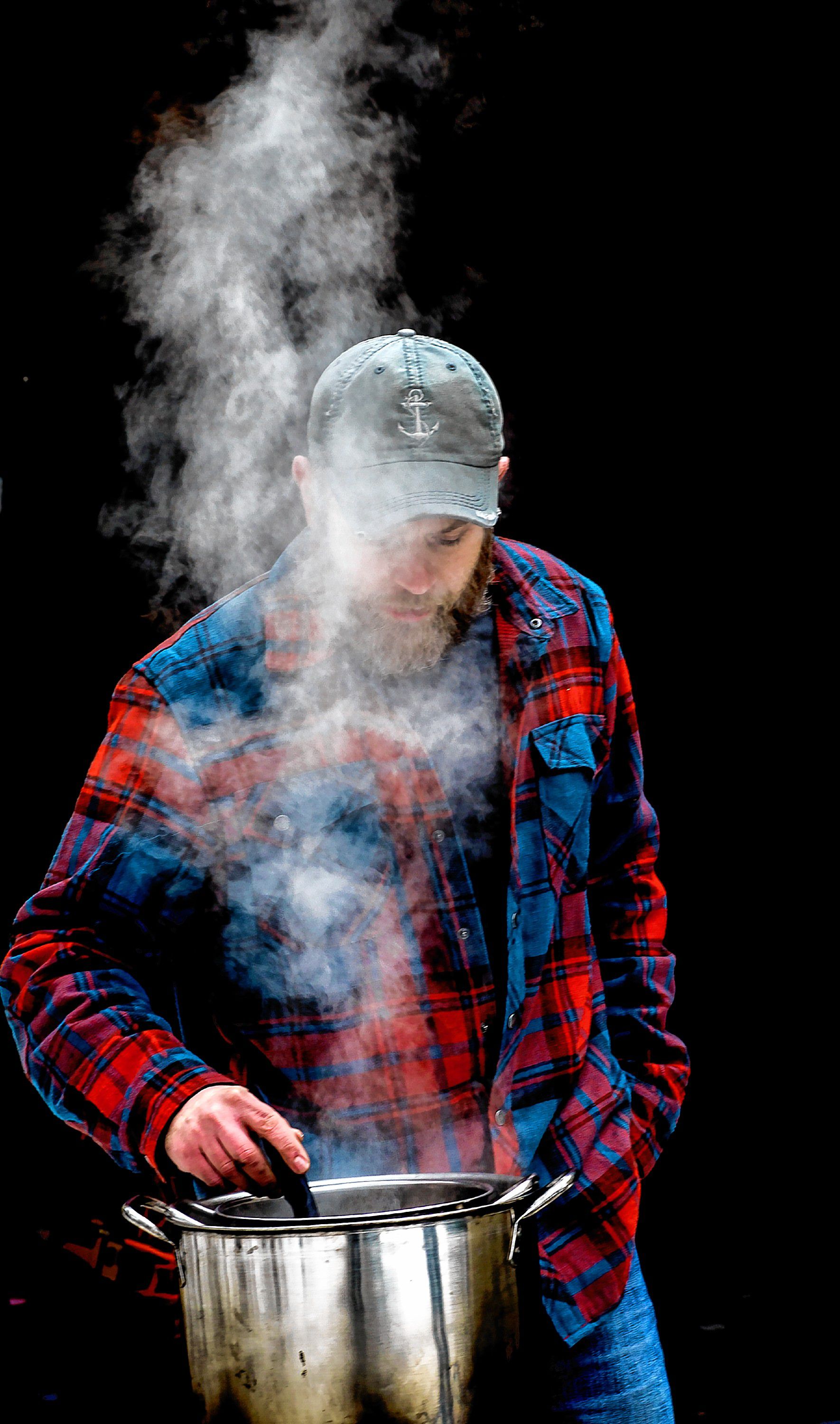 Andrew Mattiace checks on the evaporation process for a custom syrup operation at his Bow home on Saturday, March 2, 2019. GEOFF FORESTER