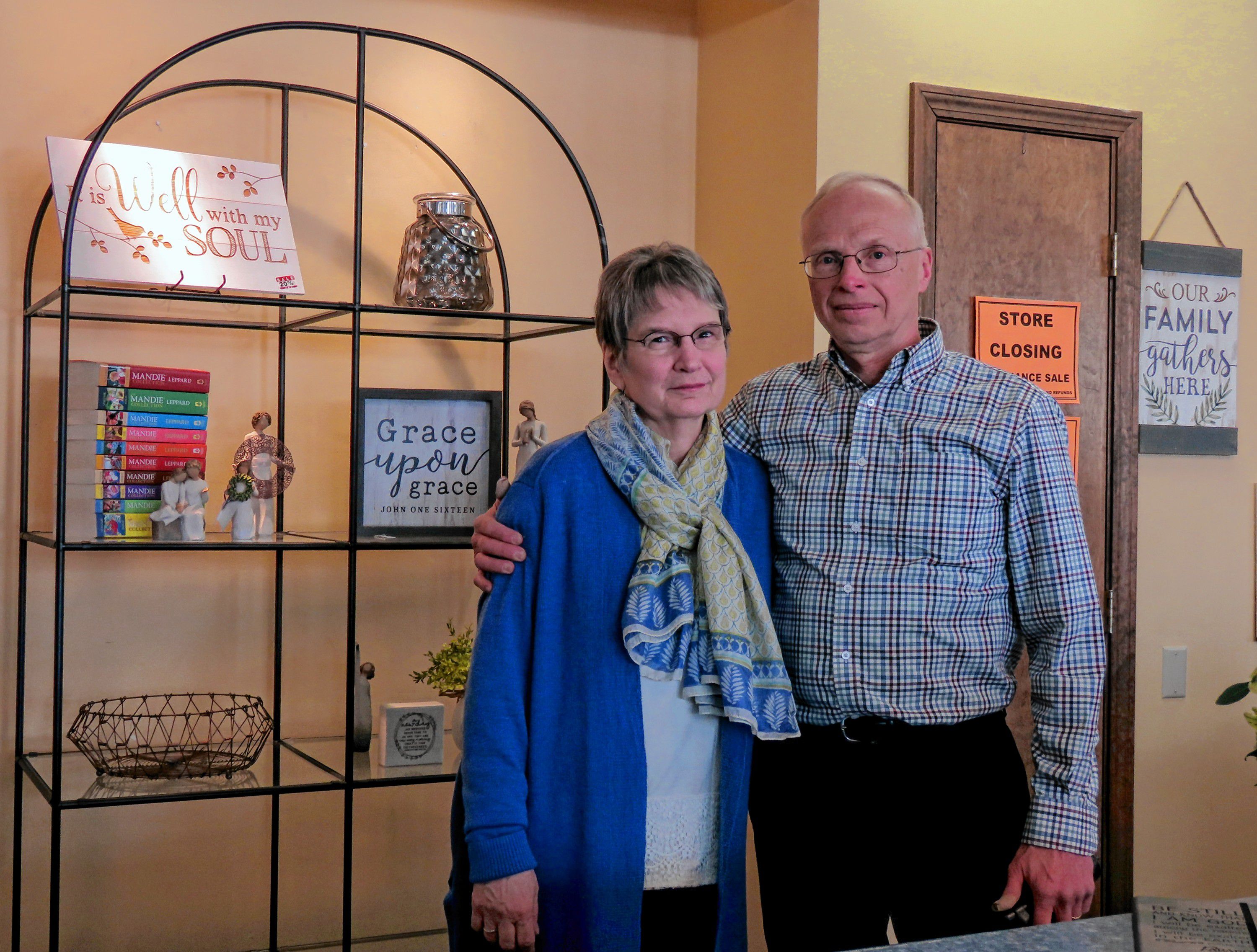 Mark and Jane Cheeseman stand at the counter of Parable Bible Bookstore on March 8, 2019. The store, one of the few kinds of speciality bookstores in the state, will be closing at the end of March. Caitlin Andrews