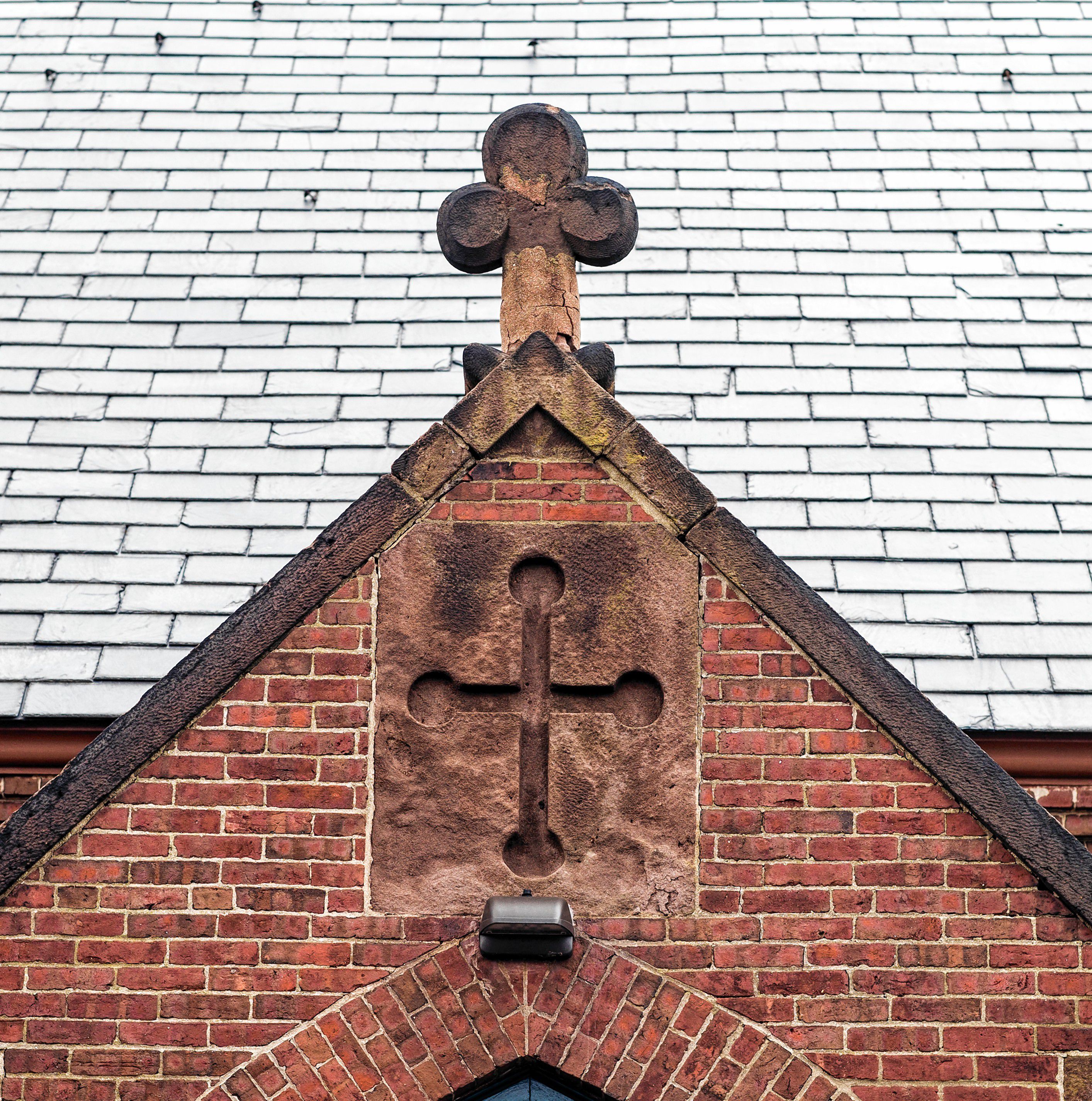 The cross above the east entrance of the United Baptist Church on South Street in Concord. GEOFF FORESTER