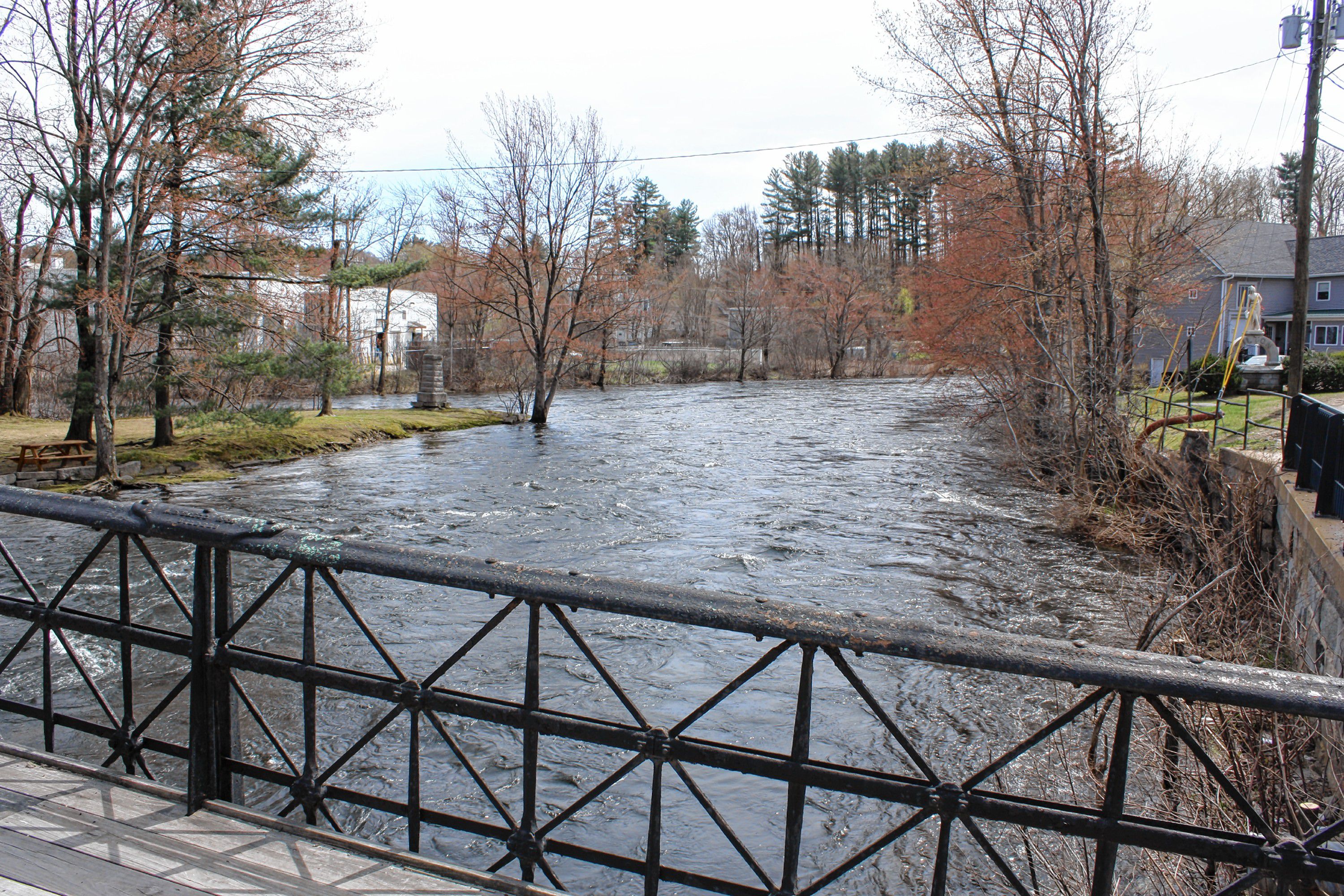 The Tilton Island Park, in the Winnipesaukee River, is one of Tilton's quaint, peaceful landmarks. The bridge that leads from the street to the island is on the National Register of Historic Places.  JON BODELL / Insider staff