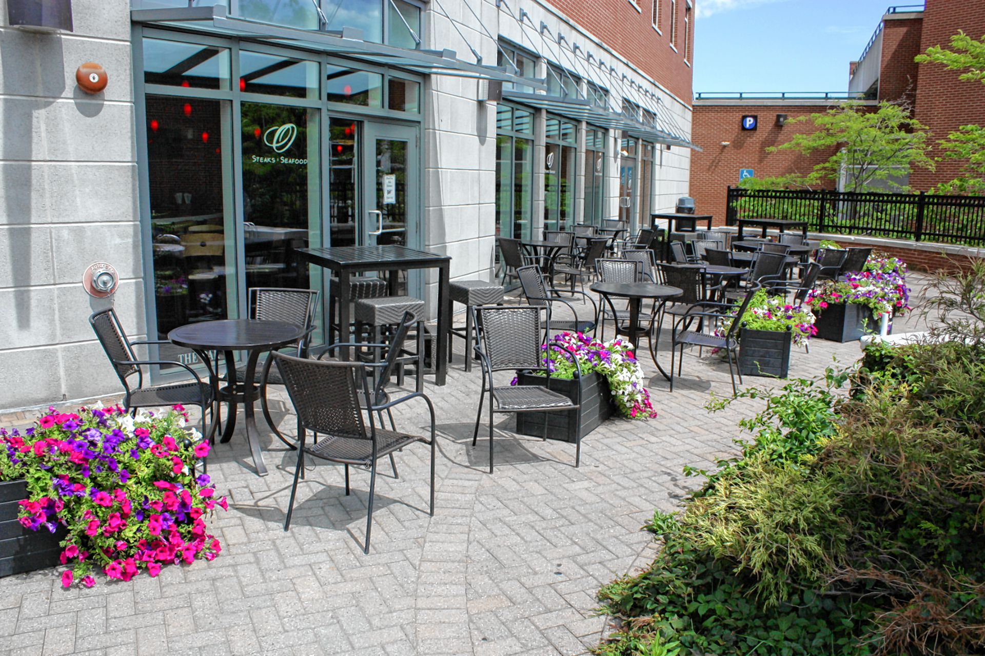 O Steaks & Seafood offers a classy patio tucked back from the sidewalk on South Main Street with seats for 42 people . JON BODELL / Insider staff