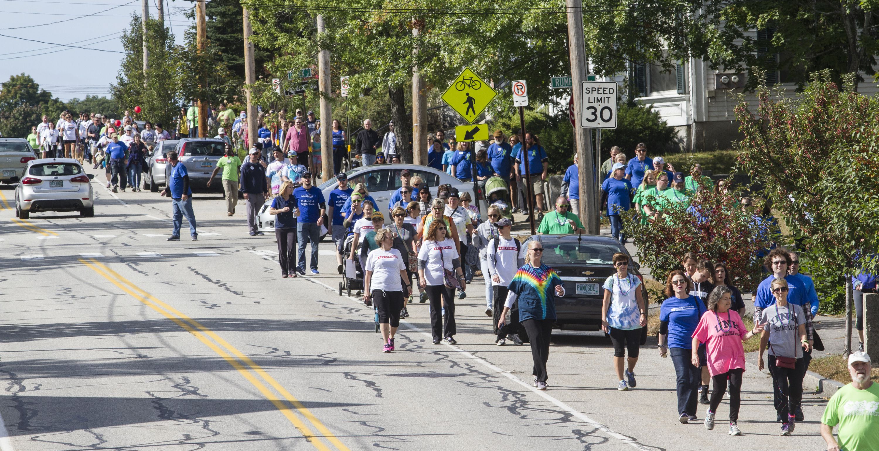 Participants in the NAMI Walk travel down Centre Street on Sunday, September 30, 2018. GEOFF FORESTER