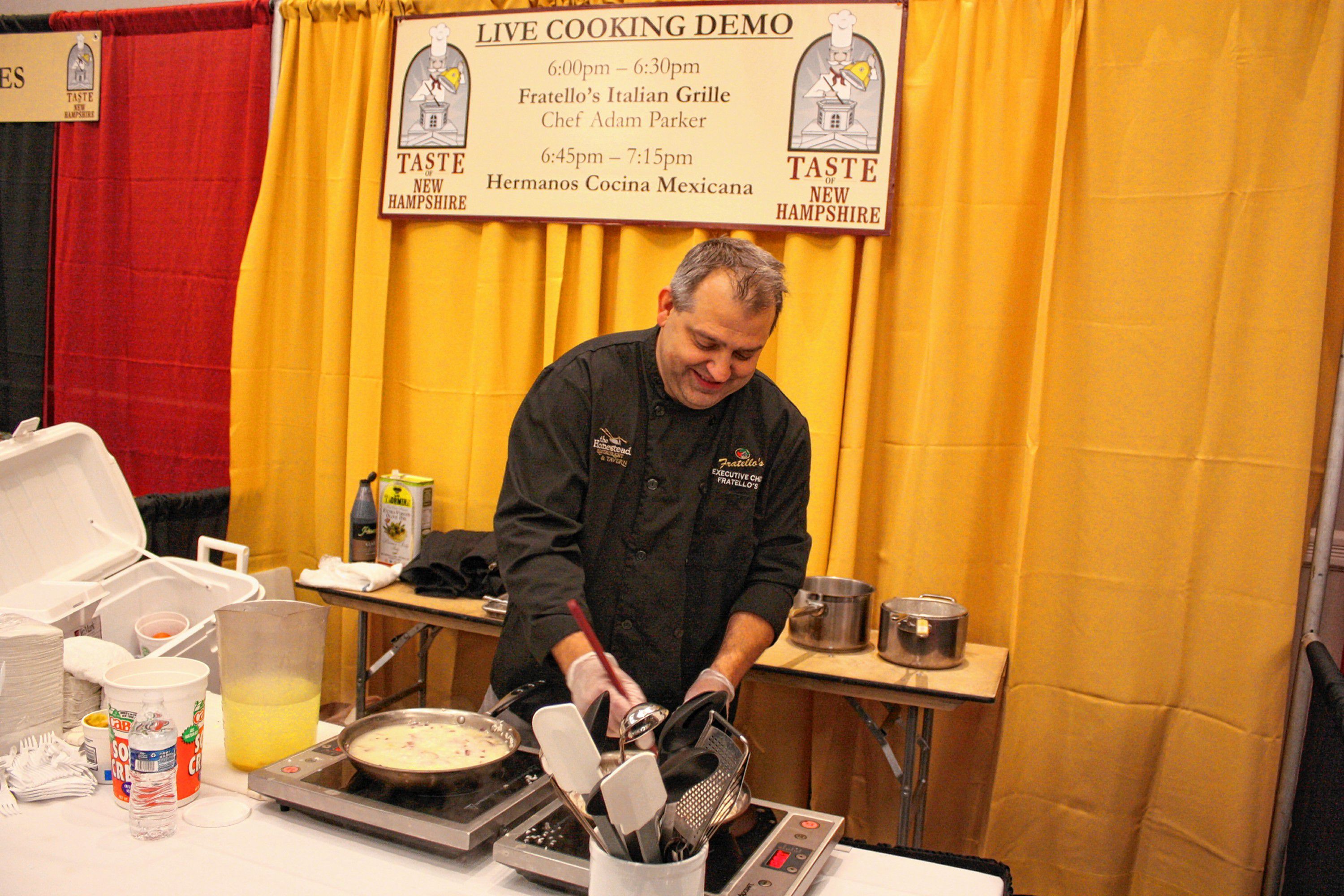 Adam Parker, corporate chef with Fratello's Italian Grille, whips up some risotto as part of his live cooking demonstration at the 14th annual Taste of New Hampshire at the Grappone Conference Center in Concord on Thursday, Oct. 17, 2019. JON BODELL / Insider staff